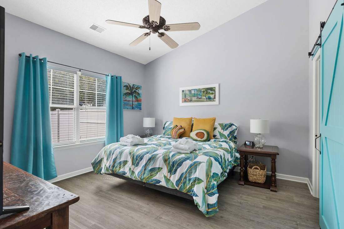 King bedroom with barn door